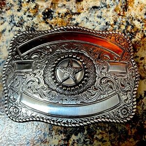Silver Crumrine belt buckle